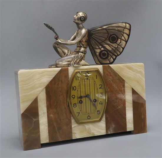 A French Art Deco marble mantel clock, with a cold painted fairy mount height 34cm